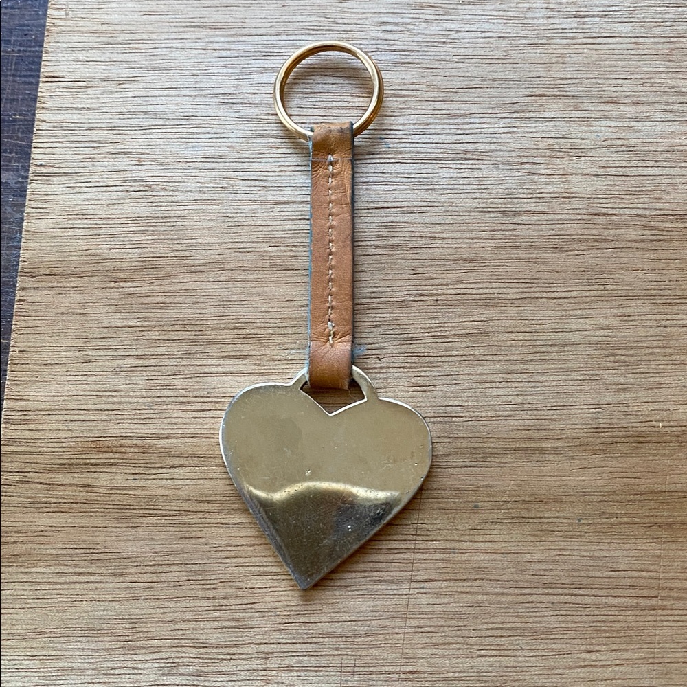 Dooney & Bourke bag charm tan strap gold hardware color in very good condition - Picture 2 of 4
